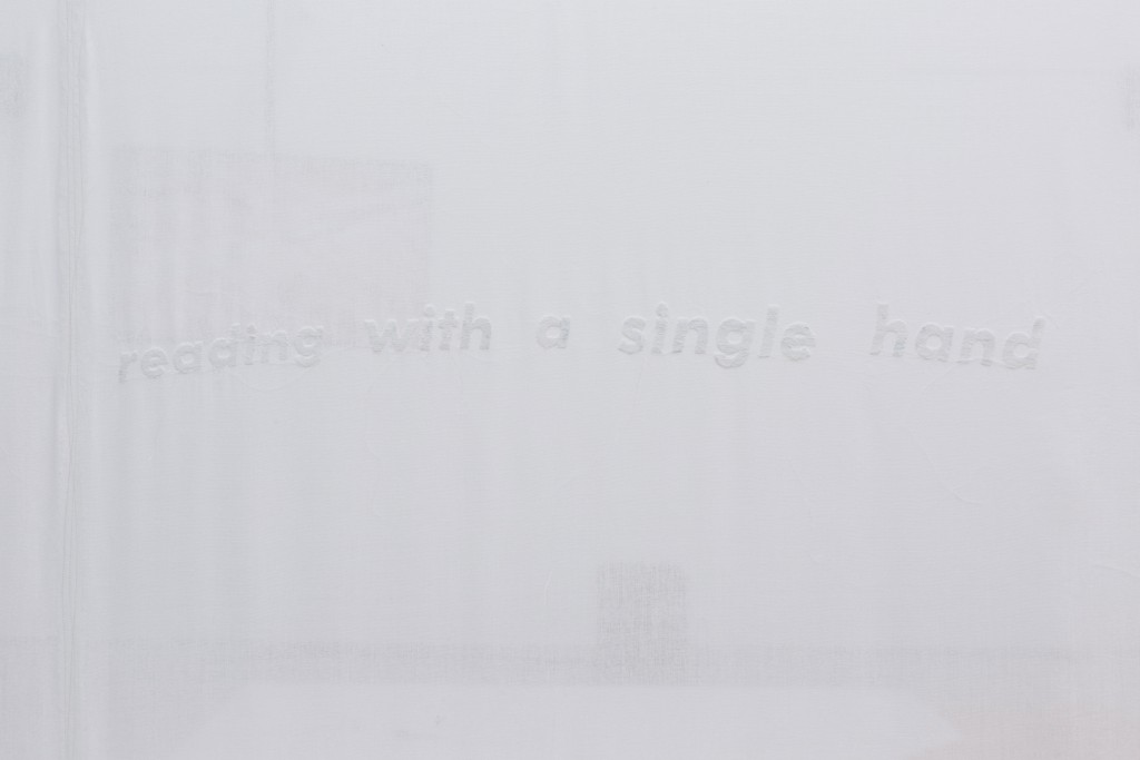 13.-YGRG14X-reading-with-the-single-hand-V,-Dorota-Gaweda-&-Egle-Kulbokaite,-Installation-View-(detail),-Video,-handmade-carpet,-Conipur-Pro-clay-dust,-handmade-curtain,-2018,-Cell-Project-Space
